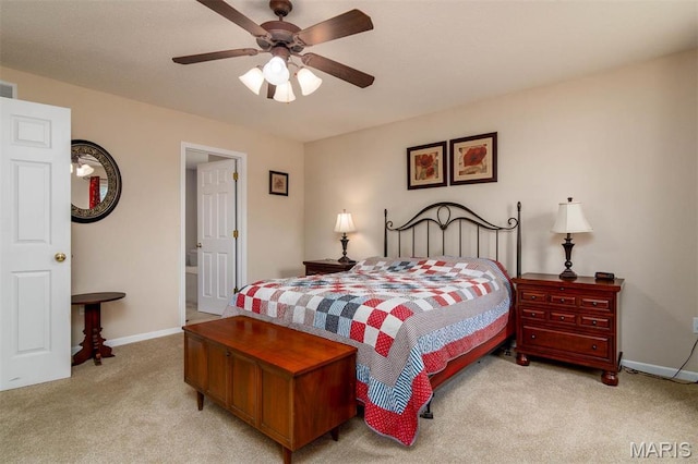 bedroom with light carpet, baseboards, and a ceiling fan