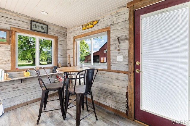 5704 Feezor Rd, Farmington, MO 63640 - dining area with wood walls, healthy amount of natural light, wood finished floors, and wood ceiling