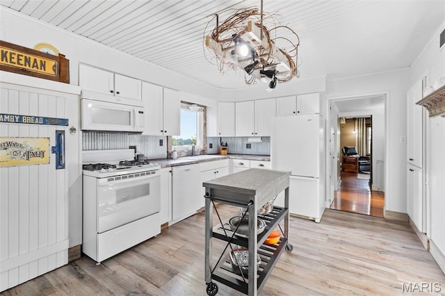 5704 Feezor Rd, Farmington, MO 63640 - kitchen with white appliances, a sink, white cabinetry, light wood-type flooring, and light countertops