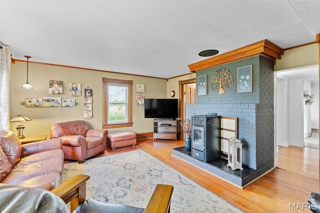 5704 Feezor Rd, Farmington, MO 63640 - living room with wood finished floors, crown molding, and baseboards