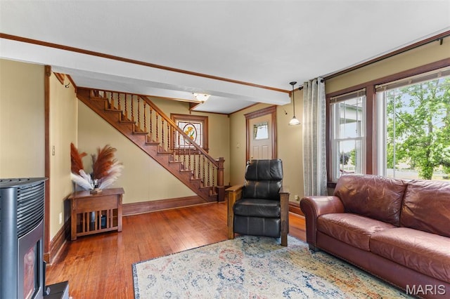 5704 Feezor Rd, Farmington, MO 63640 - living room featuring stairs, hardwood / wood-style flooring, and baseboards