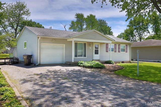 14 Dee St, Moro, IL 62067 - single story home with a garage, driveway, roof with shingles, and a front lawn