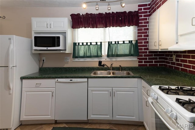 14 Dee St, Moro, IL 62067 - kitchen featuring white appliances, a sink, white cabinets, dark countertops, and decorative backsplash