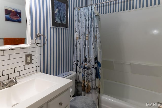 14 Dee St, Moro, IL 62067 - bathroom featuring wallpapered walls, toilet, shower / bath combo with shower curtain, and vanity