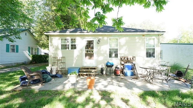 811 N Catalpa St, Dexter, MO 63841 - rear view of property featuring entry steps and a patio area