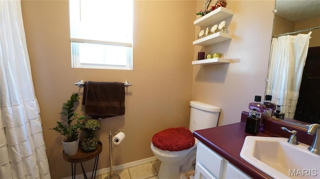 811 N Catalpa St, Dexter, MO 63841 - bathroom featuring toilet, vanity, and tile patterned floors