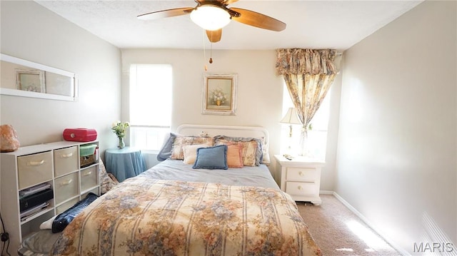 811 N Catalpa St, Dexter, MO 63841 - carpeted bedroom featuring baseboards and a ceiling fan