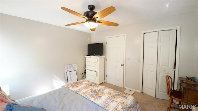 811 N Catalpa St, Dexter, MO 63841 - carpeted bedroom featuring a closet, a ceiling fan, and baseboards