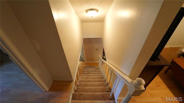 811 N Catalpa St, Dexter, MO 63841 - staircase featuring wood finished floors and baseboards