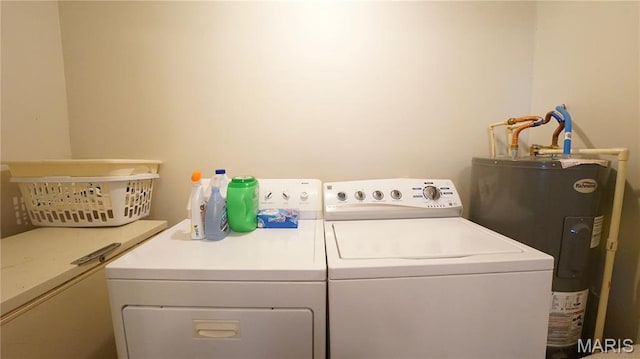811 N Catalpa St, Dexter, MO 63841 - washroom with washer and dryer and water heater