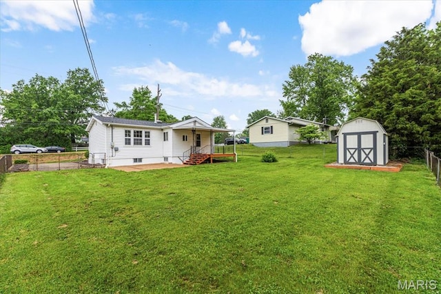 1522 S Elm Ave, Saint Louis, MO 63119 - rear view of house featuring a shed, an outbuilding, and a patio