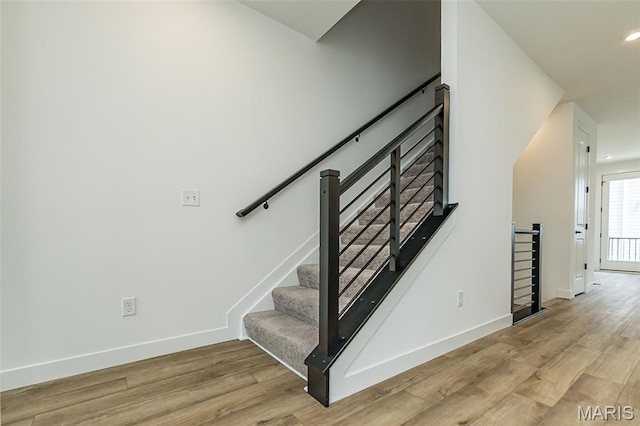 8924 Gateway Cir, Richmond Heights, MO 63144 - staircase featuring wood finished floors, baseboards, and recessed lighting