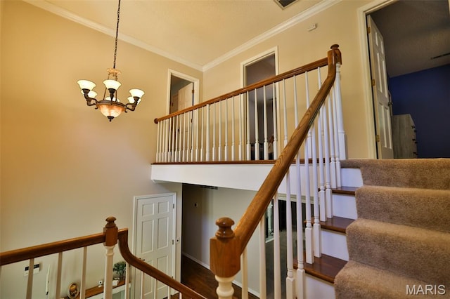 1989 Dogwood Trl, Collinsville, IL 62234 - staircase with crown molding, a chandelier, and wood finished floors