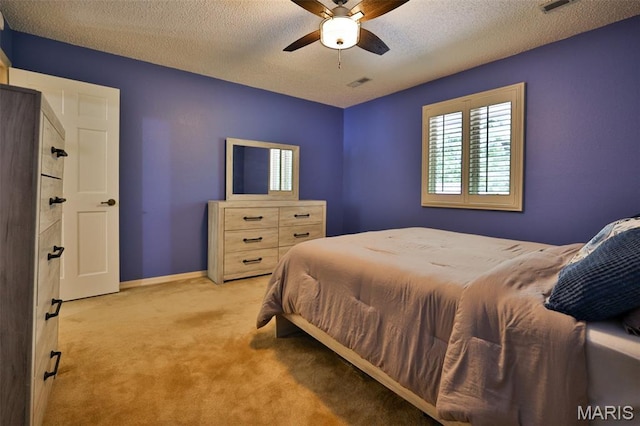 1989 Dogwood Trl, Collinsville, IL 62234 - bedroom with light carpet, a textured ceiling, baseboards, and ceiling fan