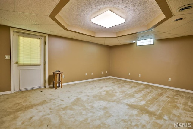 1989 Dogwood Trl, Collinsville, IL 62234 - below grade area featuring carpet flooring, baseboards, and a paneled ceiling