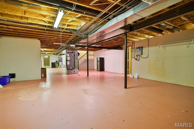 1989 Dogwood Trl, Collinsville, IL 62234 - unfinished below grade area featuring freestanding refrigerator
