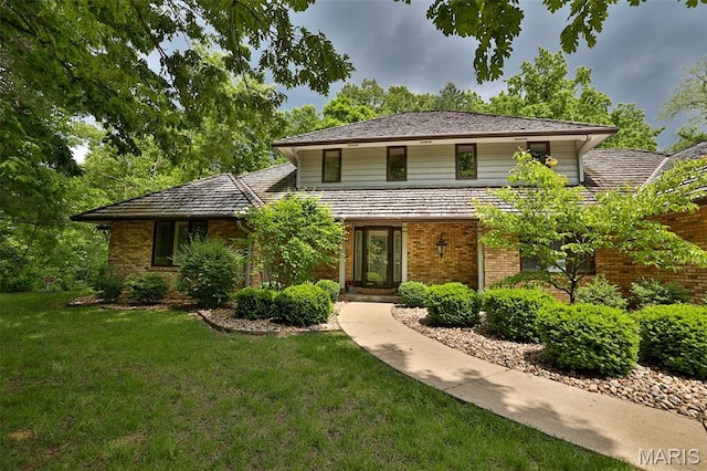1989 Dogwood Trl, Collinsville, IL 62234 - view of front of house with brick siding and a front lawn
