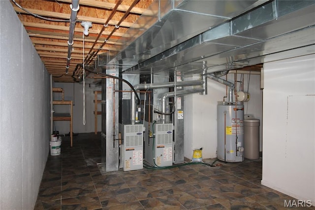 unfinished basement featuring gas water heater