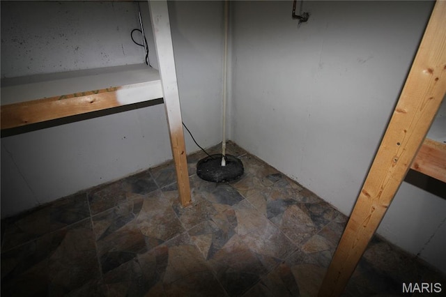 bathroom with stone finish flooring