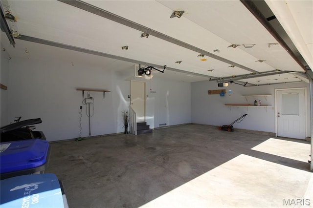 garage featuring a garage door opener