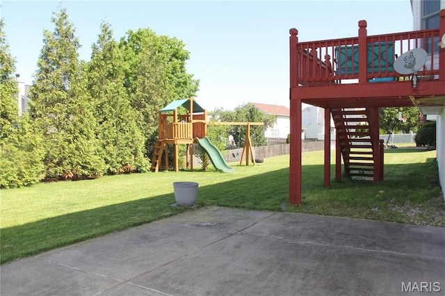 view of jungle gym with stairs and a deck