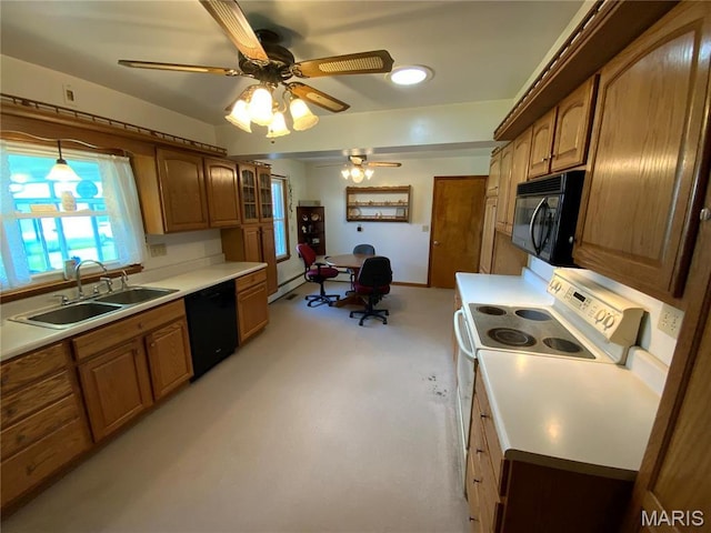 401 Edinger Rd, Wentzville, MO 63385 - kitchen featuring black appliances, a sink, brown cabinetry, a ceiling fan, and light countertops