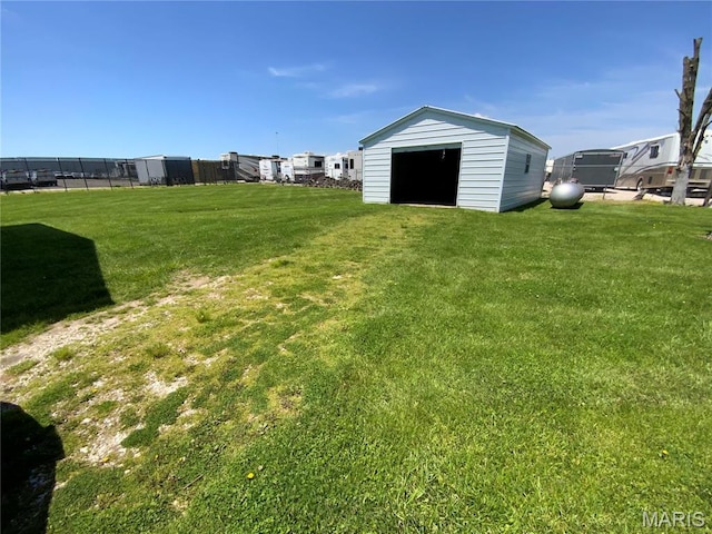 401 Edinger Rd, Wentzville, MO 63385 - view of green lawn featuring an outbuilding