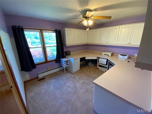 401 Edinger Rd, Wentzville, MO 63385 - office space featuring a baseboard heating unit, a ceiling fan, and light colored carpet