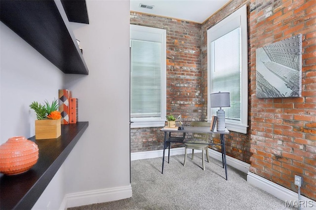 2713 Utah St, Saint Louis, MO 63118 - carpeted office space featuring baseboards and brick wall
