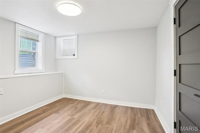 2713 Utah St, Saint Louis, MO 63118 - empty room with wood finished floors and baseboards