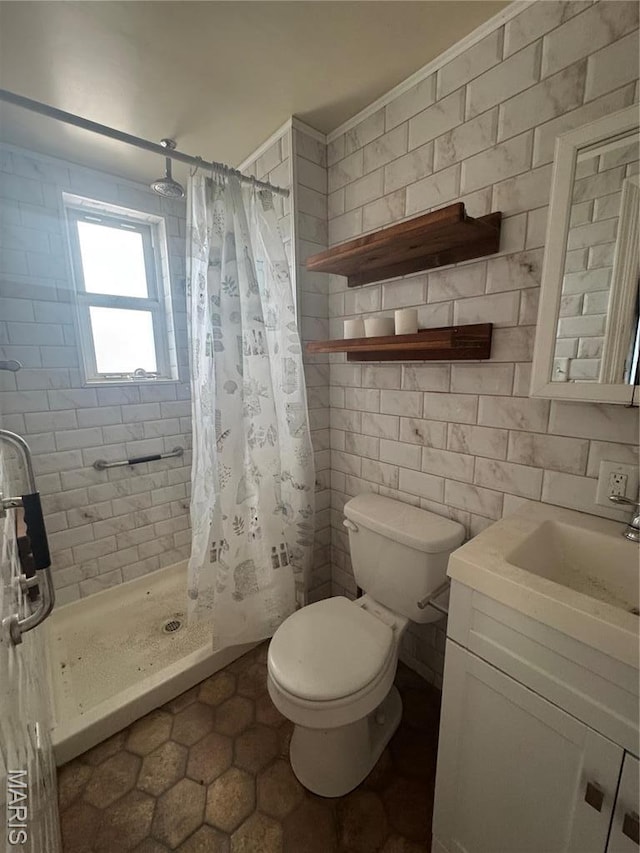 2442 Adams St, Granite City, IL 62040 - full bath featuring toilet, a stall shower, vanity, and tile patterned floors