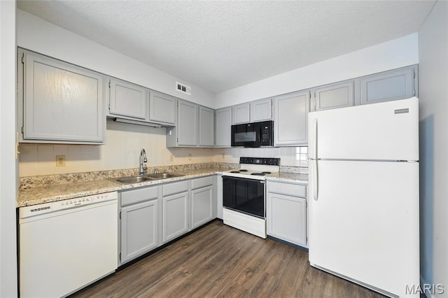 9 Berview Cir Unit H, Saint Louis, MO 63129 - kitchen with white appliances, a sink, dark wood finished floors, gray cabinets, and light countertops