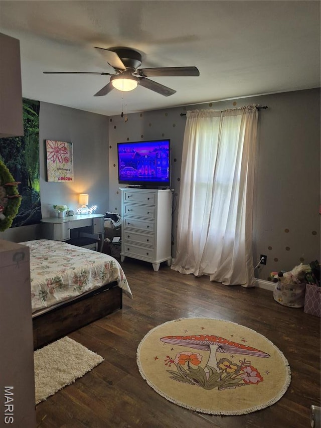 bedroom with wood finished floors and ceiling fan