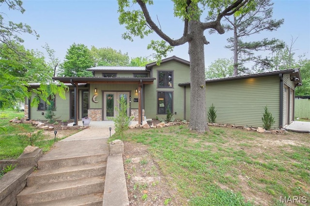 732 N Main St, Poplar Bluff, MO 63901 - view of front of home with french doors and stone siding