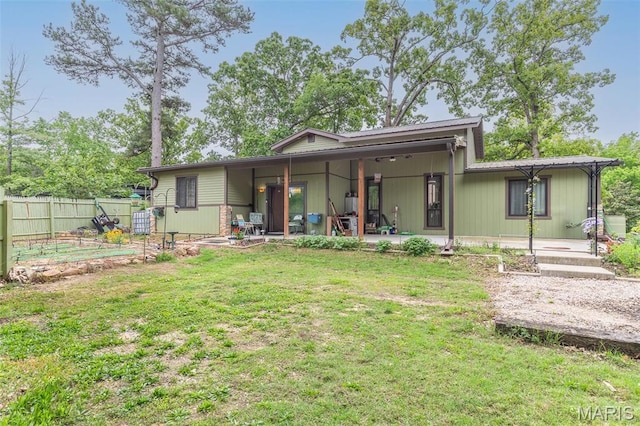 732 N Main St, Poplar Bluff, MO 63901 - rear view of property with a patio