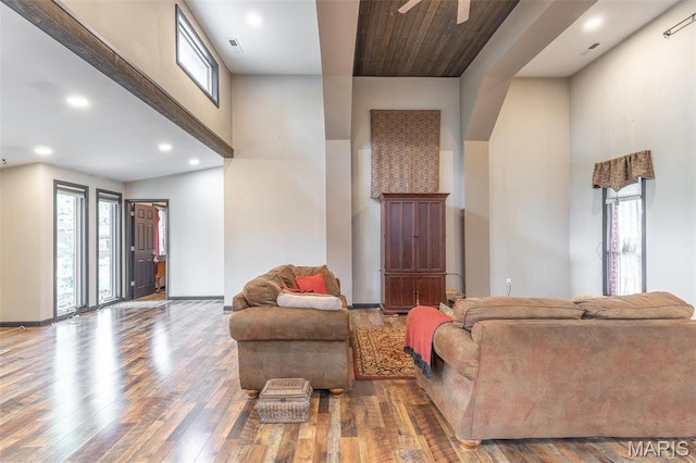 732 N Main St, Poplar Bluff, MO 63901 - living room featuring wood finished floors, ceiling fan, baseboards, recessed lighting, and a towering ceiling