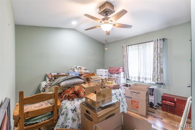 732 N Main St, Poplar Bluff, MO 63901 - bedroom with wood finished floors, vaulted ceiling, and a ceiling fan