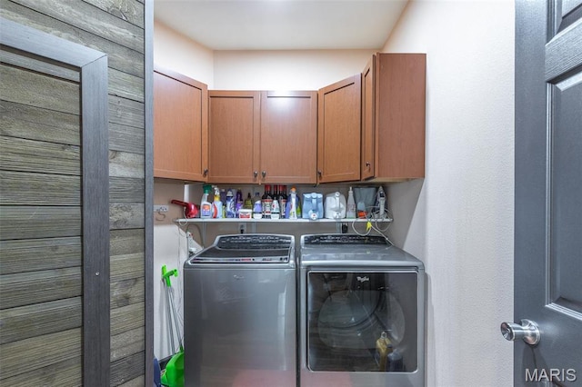 732 N Main St, Poplar Bluff, MO 63901 - laundry room featuring separate washer and dryer and cabinet space