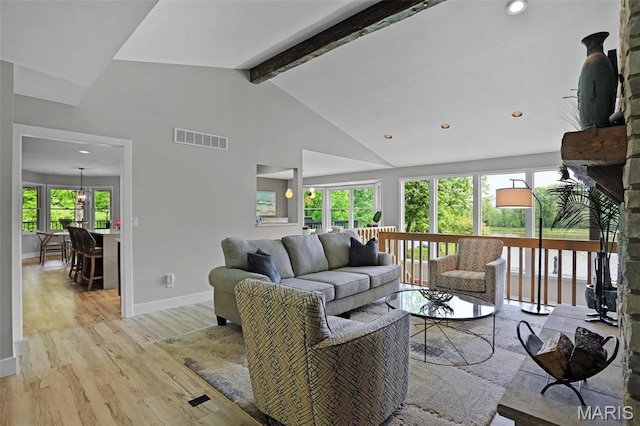 living area with beam ceiling, baseboards, light wood-type flooring, recessed lighting, and high vaulted ceiling