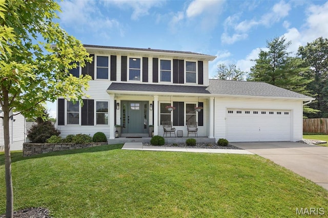 66 Walnutshade Ct, Saint Peters, MO 63376 - view of front facade featuring an attached garage, driveway, and a porch