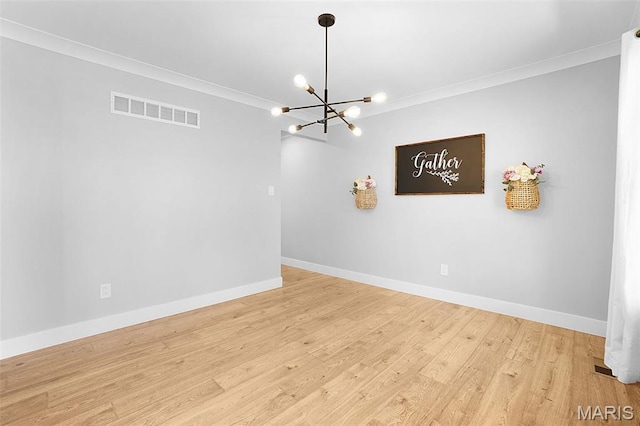 66 Walnutshade Ct, Saint Peters, MO 63376 - empty room featuring a chandelier, ornamental molding, and wood finished floors
