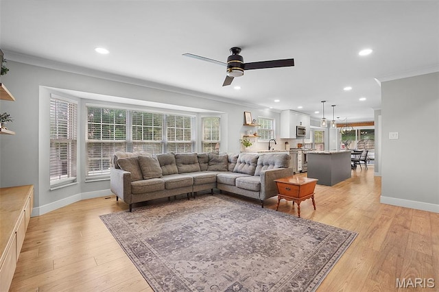 66 Walnutshade Ct, Saint Peters, MO 63376 - living room featuring ornamental molding, plenty of natural light, ceiling fan, light wood-style flooring, and recessed lighting