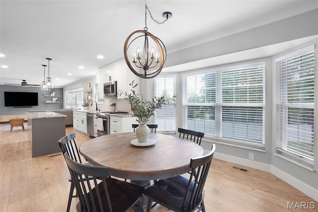 66 Walnutshade Ct, Saint Peters, MO 63376 - dining space featuring a chandelier, recessed lighting, and light wood-style floors