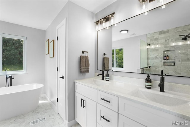 66 Walnutshade Ct, Saint Peters, MO 63376 - full bath featuring a stall shower, double vanity, a soaking tub, and tile patterned floors
