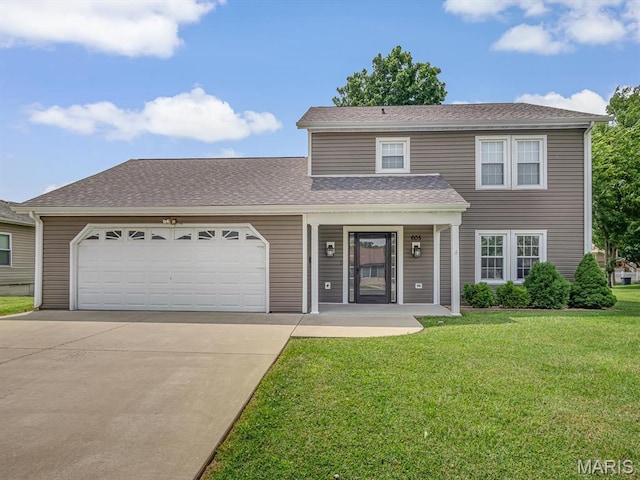 605 S Ridge Ave, Steeleville, IL 62288 - traditional-style home with driveway, a front yard, an attached garage, roof with shingles, and a porch