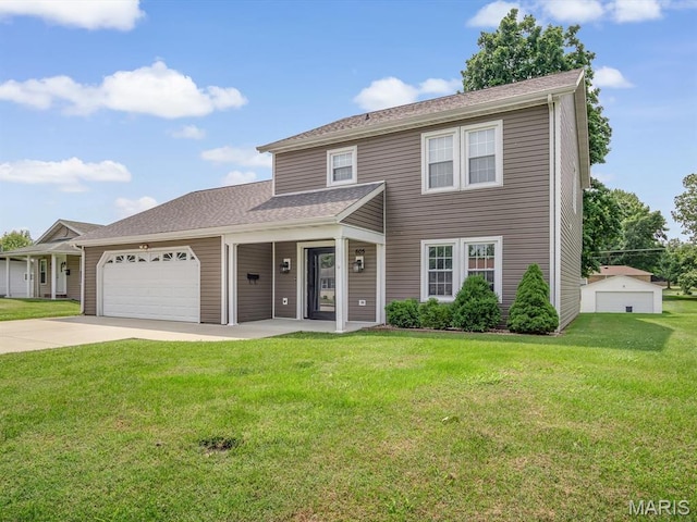 605 S Ridge Ave, Steeleville, IL 62288 - traditional home with concrete driveway, a garage, and a front yard
