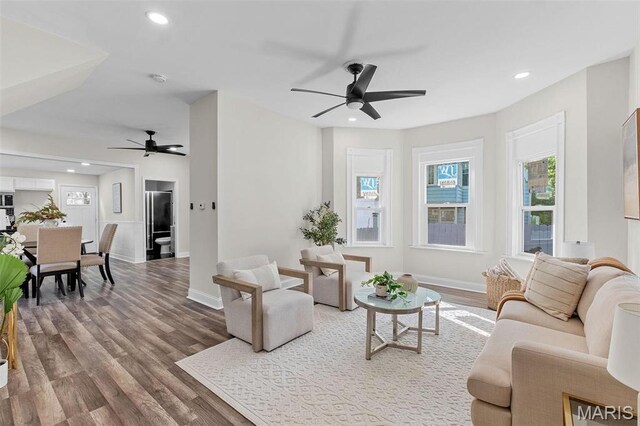 7211 Kensington Ave, Maplewood, MO 63143 - living area with ceiling fan, wood finished floors, recessed lighting, and baseboards