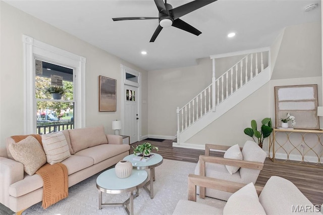 7211 Kensington Ave, Maplewood, MO 63143 - living area with stairs, wood finished floors, recessed lighting, a ceiling fan, and baseboards