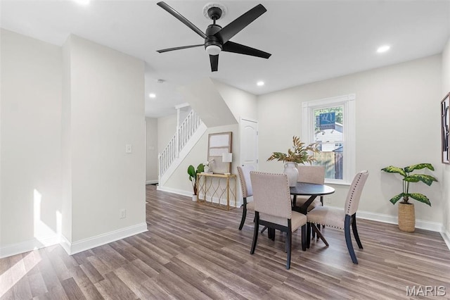 7211 Kensington Ave, Maplewood, MO 63143 - dining space with stairway, wood finished floors, ceiling fan, and recessed lighting