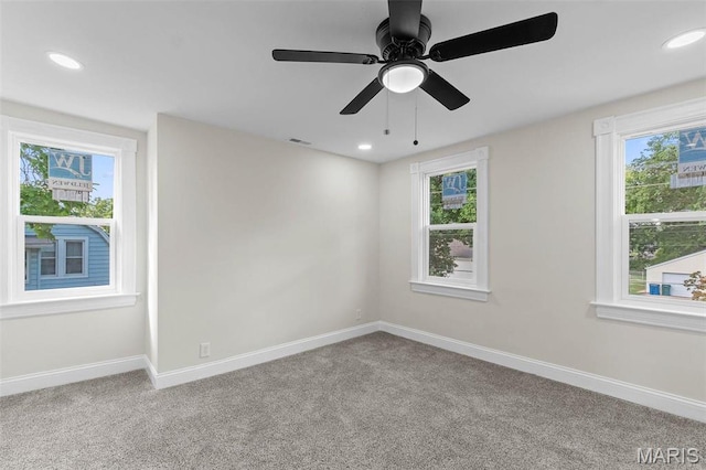 7211 Kensington Ave, Maplewood, MO 63143 - carpeted empty room featuring plenty of natural light, baseboards, recessed lighting, and ceiling fan